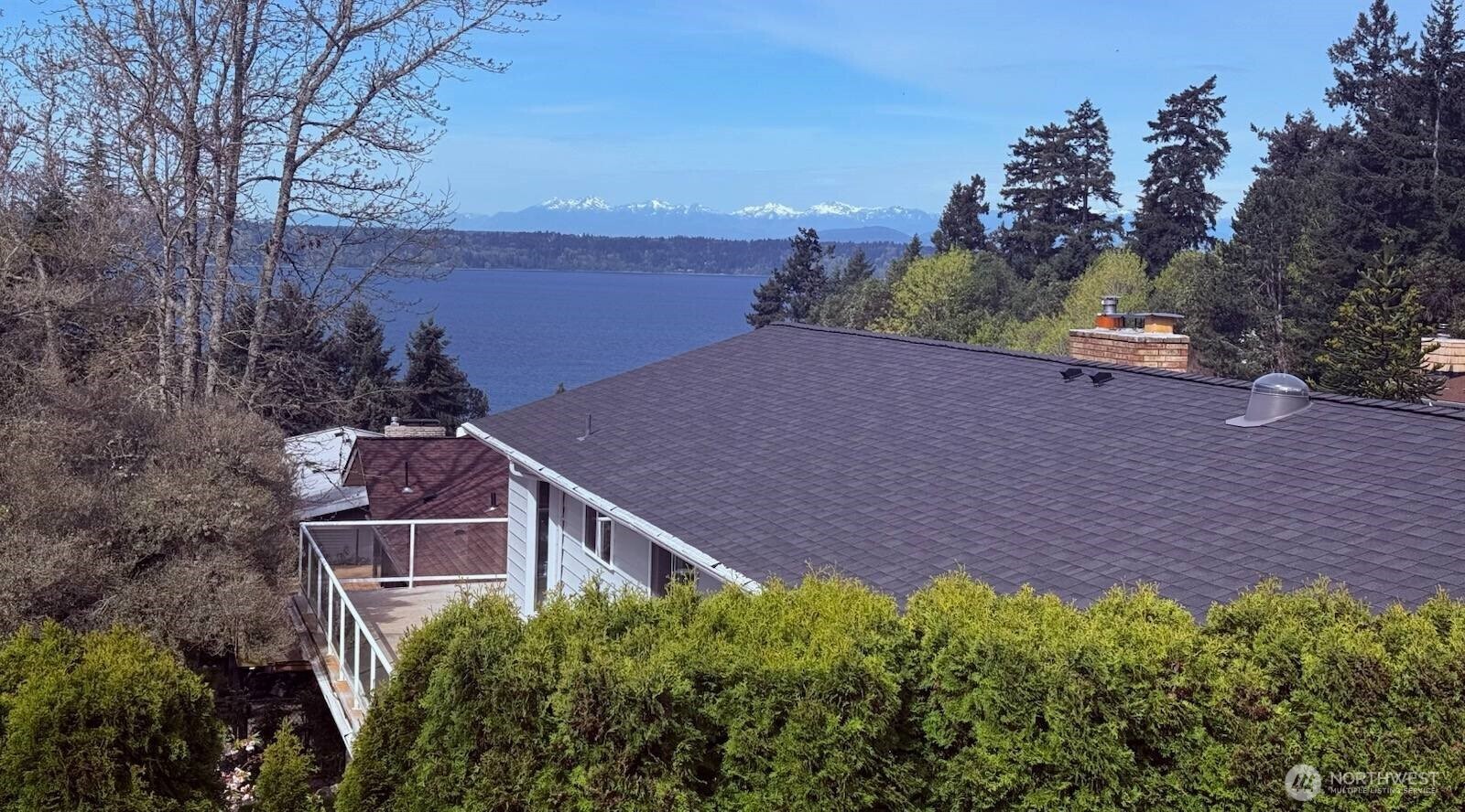 1401 Southwest 137th Street Burien, WA 98166 - Photo 36 of 40 an aerial view of house with yard and mountain in the back