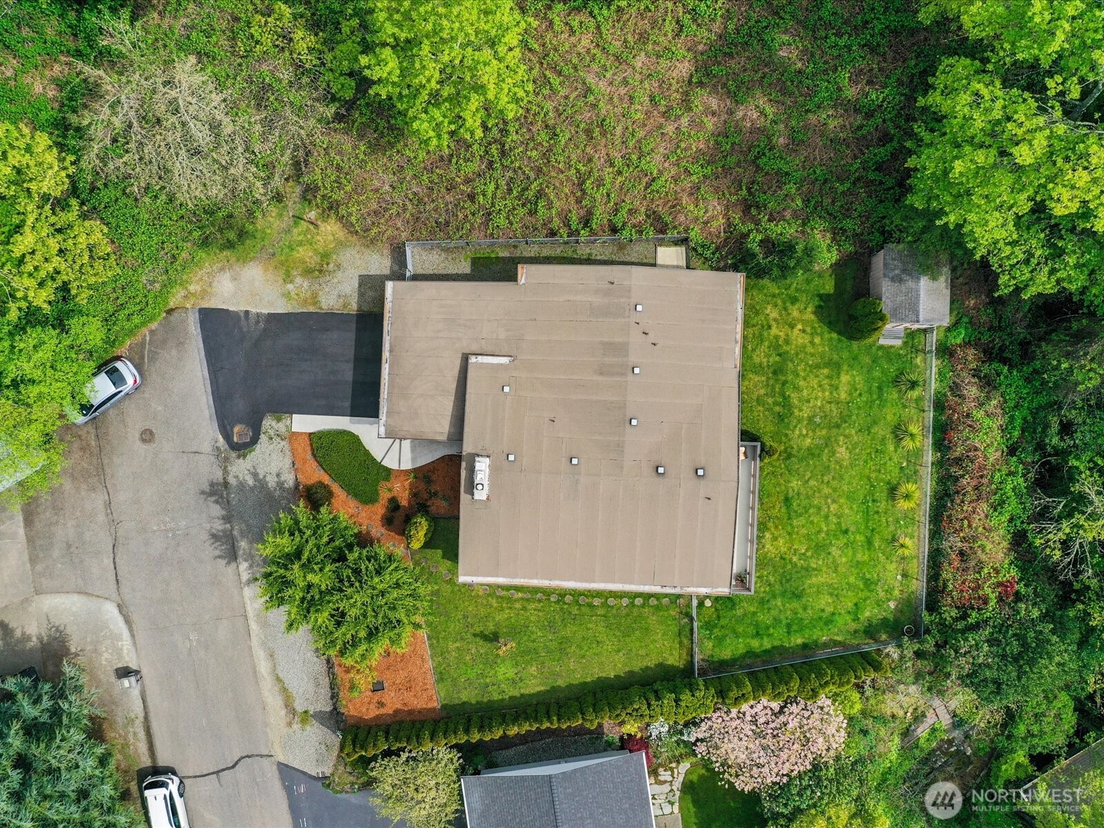 1401 Southwest 137th Street Burien, WA 98166 - Photo 40 of 40 an aerial view of a house with a yard and outdoor seating