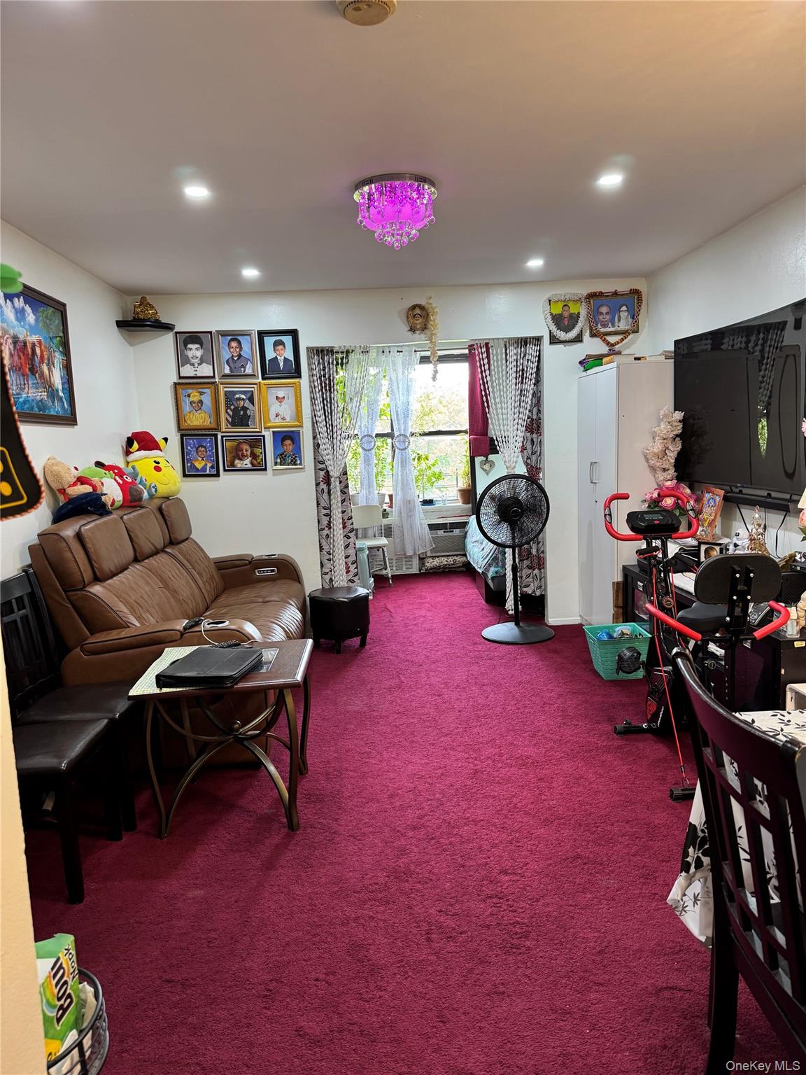 87-70 173rd Street, Unit 7H Queens, NY 11432 - Photo 2 of 6 Living room featuring carpet and recessed lighting
