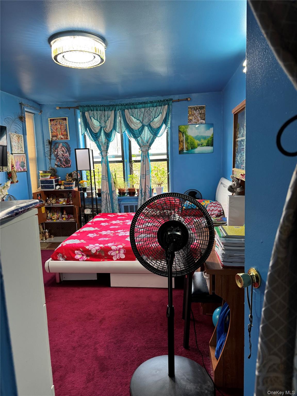 87-70 173rd Street, Unit 7H Queens, NY 11432 - Photo 5 of 6 Bedroom featuring carpet flooring