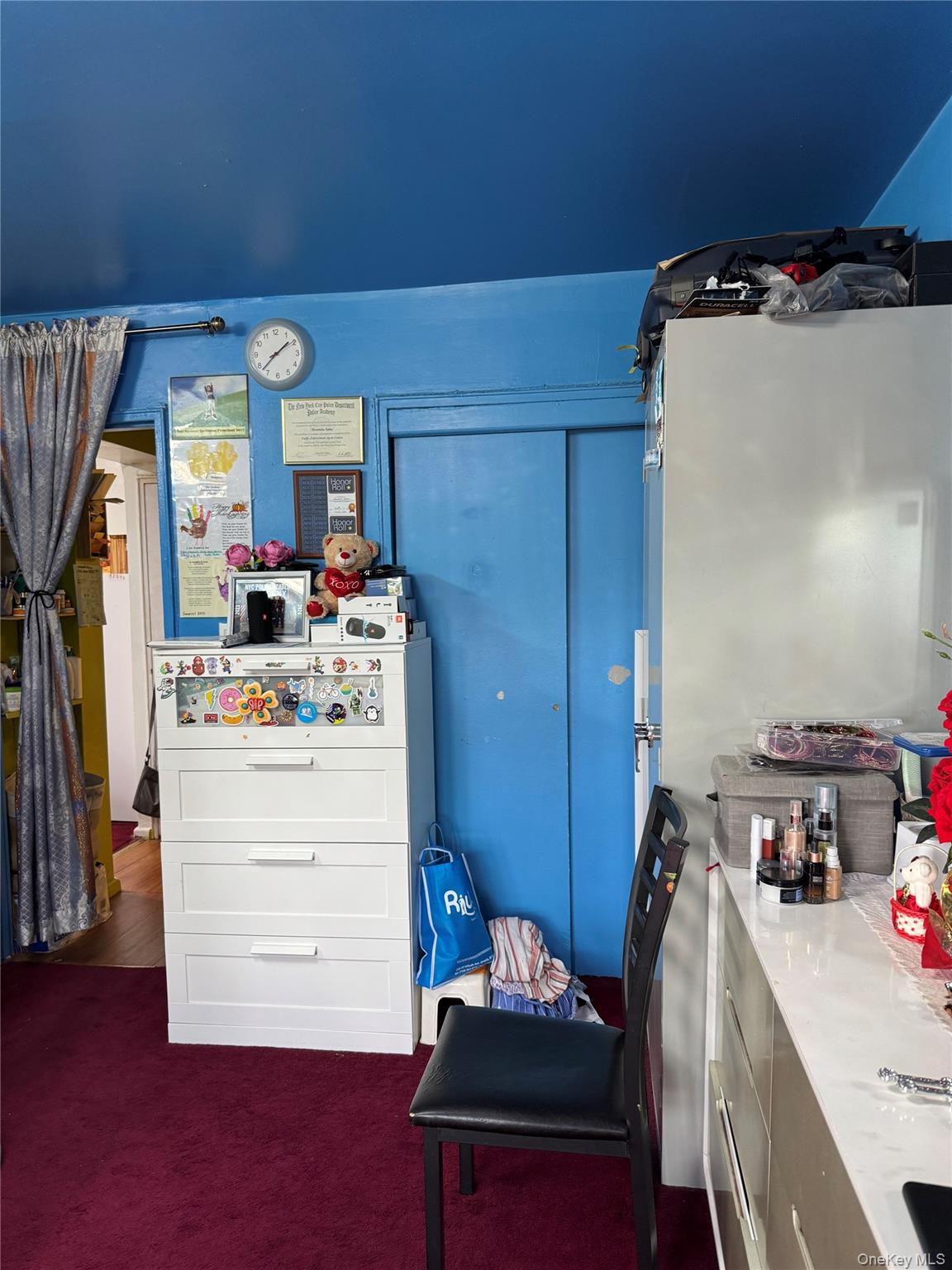 87-70 173rd Street, Unit 7H Queens, NY 11432 - Photo 6 of 6 Miscellaneous room featuring dark carpet