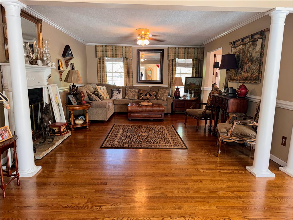 208 Knoxwood Court Anderson, SC 29621 - Photo 14 of 38 This inviting living room features gleaming hardwood floors and a cozy fireplace.