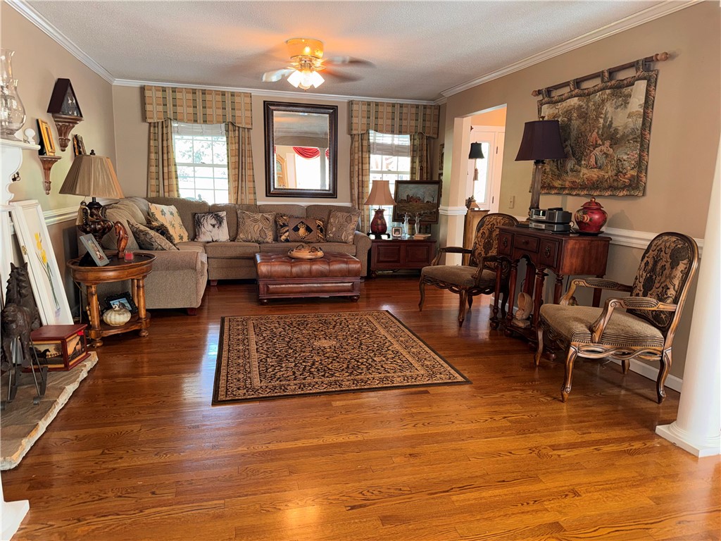 208 Knoxwood Court Anderson, SC 29621 - Photo 15 of 38 This inviting space features classic design elements and rich hardwood floors.