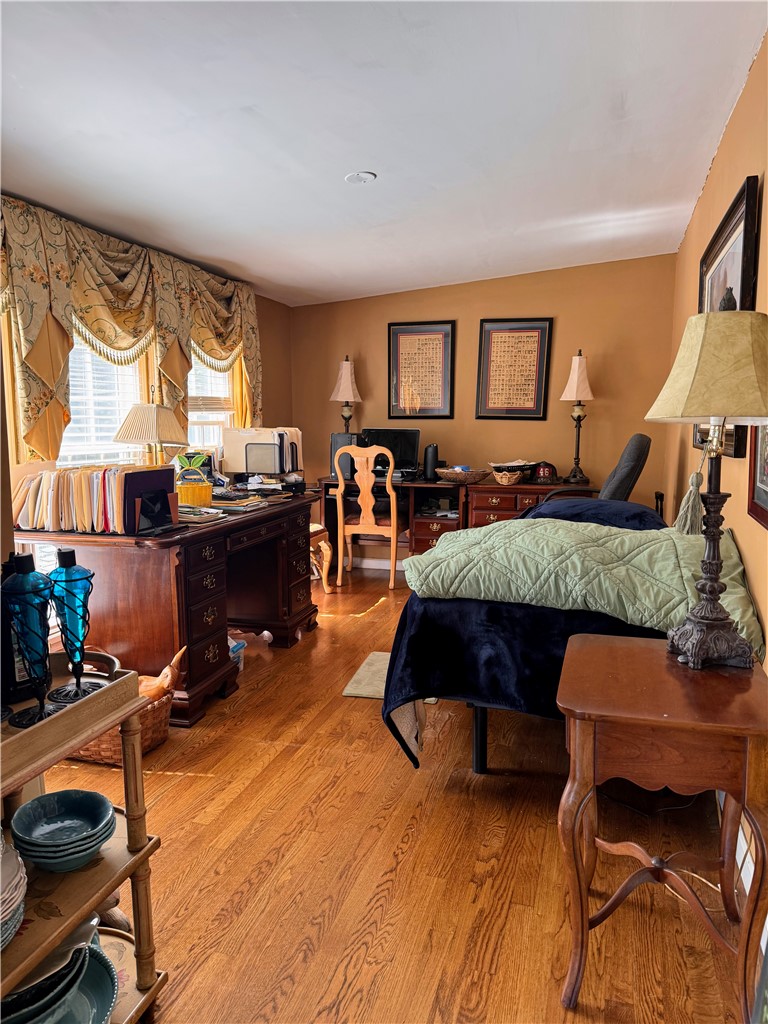 208 Knoxwood Court Anderson, SC 29621 - Photo 16 of 38 This versatile room features warm hardwood floors and abundant natural light, perfect for a productive home office or guest quarters.