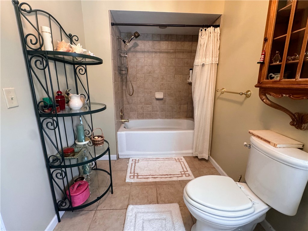 208 Knoxwood Court Anderson, SC 29621 - Photo 24 of 38 This functional bathroom features a tub-shower combination and tiled flooring.