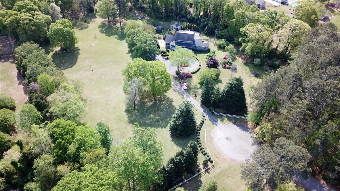 208 Knoxwood Court Anderson, SC 29621 - Photo 27 of 38 This expansive estate offers a serene retreat with vast open spaces and mature trees.