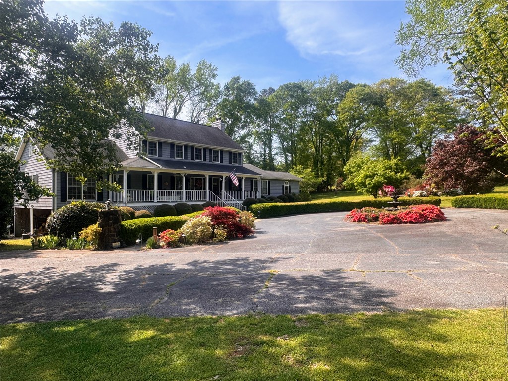 208 Knoxwood Court Anderson, SC 29621 - Photo 3 of 38 This charming home features a welcoming porch and a beautifully landscaped yard, perfect for outdoor enjoyment.