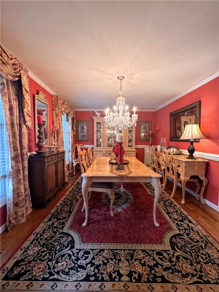208 Knoxwood Court Anderson, SC 29621 - Photo 4 of 38 This formal dining room offers an elegant setting for memorable gatherings and intimate meals.