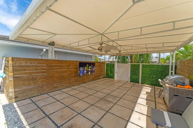 a view of a backyard with garden