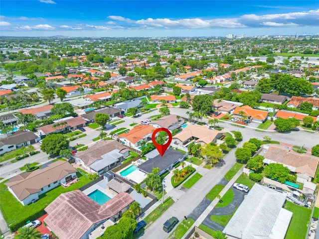 a view of city and green space