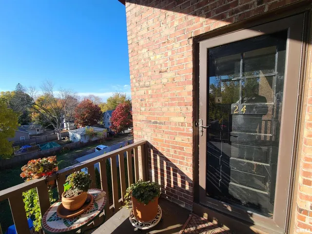a view of street from balcony
