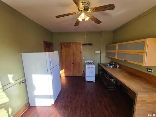 a room with wooden floors and walls