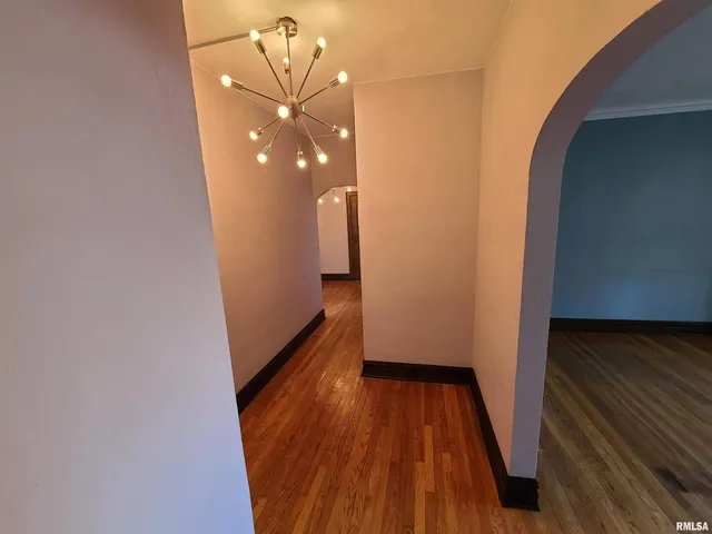 a view of a livingroom with wooden floor