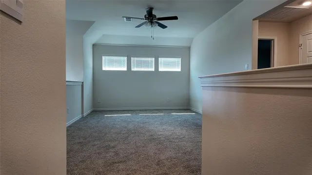 a view of a window in an empty room