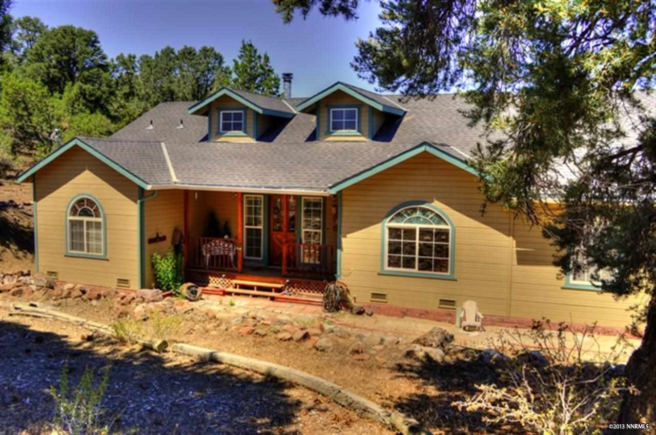 2410 Grizzley Road Reno, NV 89521 - Photo 1 of 1 a front view of a house with a yard