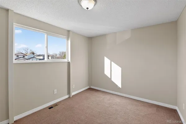 an empty room with window