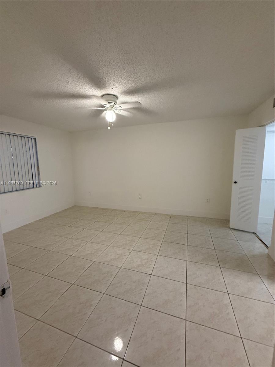 761 North Pine Island Road, Unit 104 Plantation, FL 33324 - Photo 26 of 26 a view of an empty room with a window
