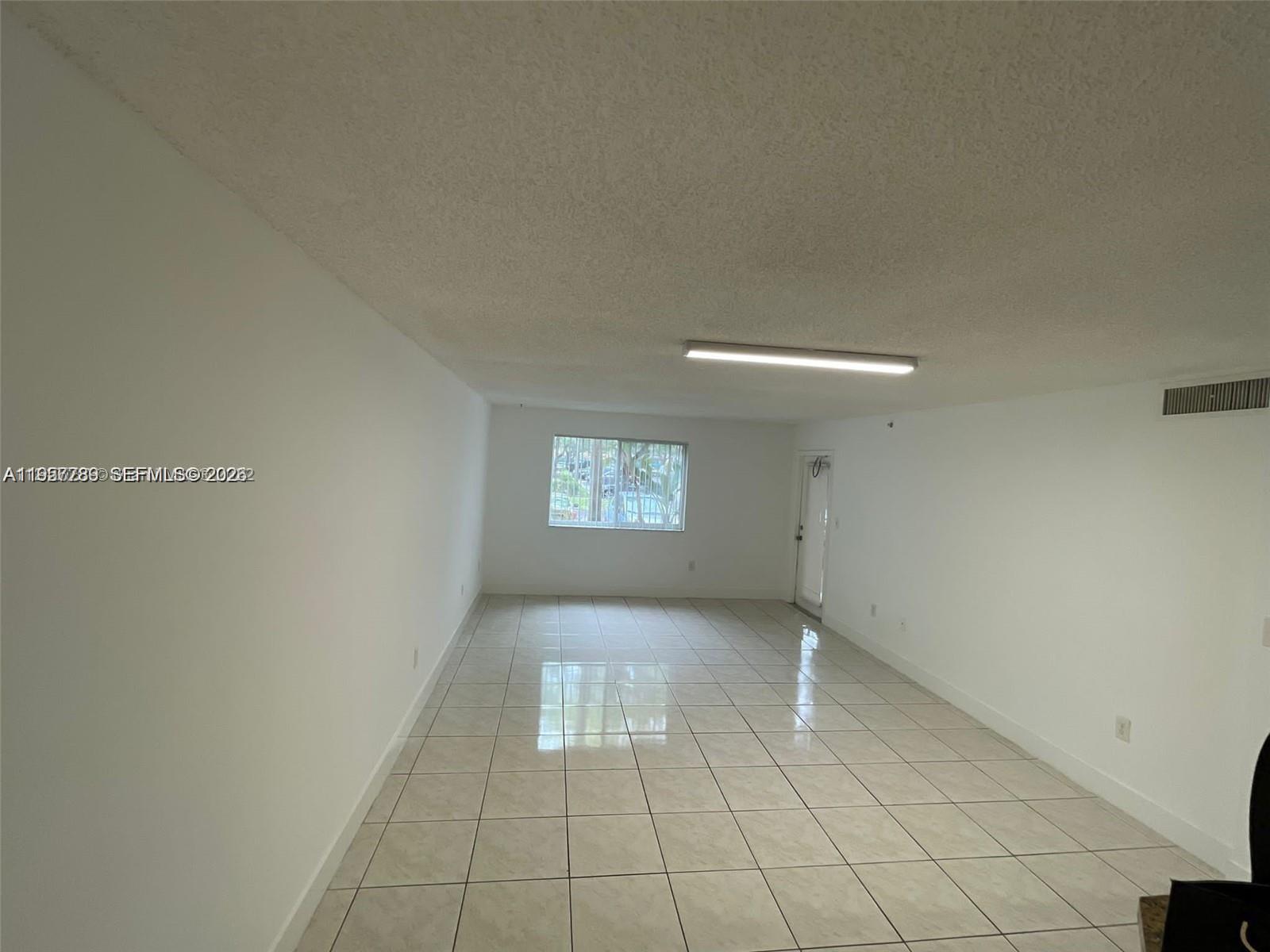 761 North Pine Island Road, Unit 104 Plantation, FL 33324 - Photo 7 of 15 a view of an empty room