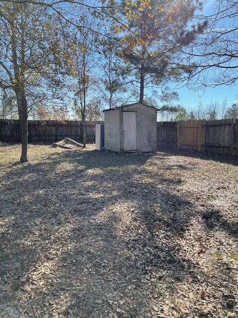 2264 County Road 3405 Cleveland, TX 77327 - Photo 7 of 10 a backyard of a house