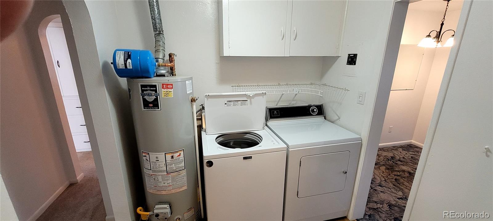 3450 Benton Street Wheat Ridge, CO 80212 - Photo 7 of 20 a utility room with dryer and washer
