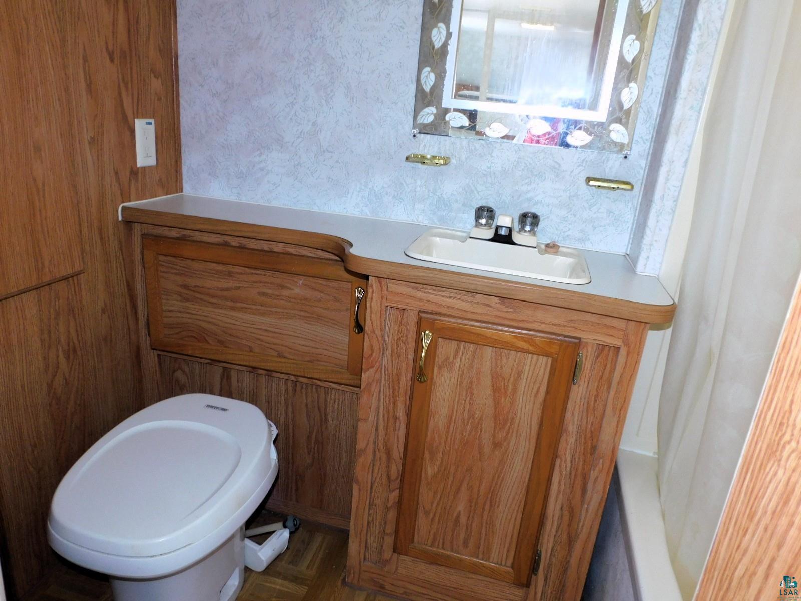 85-xxx Fireplace Road Port Wing, WI 54865 - Photo 14 of 37 Bathroom with a shower