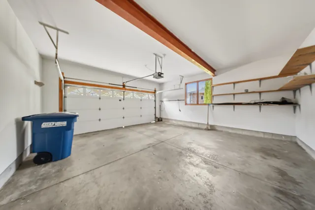 a view of a wooden deck and a yard