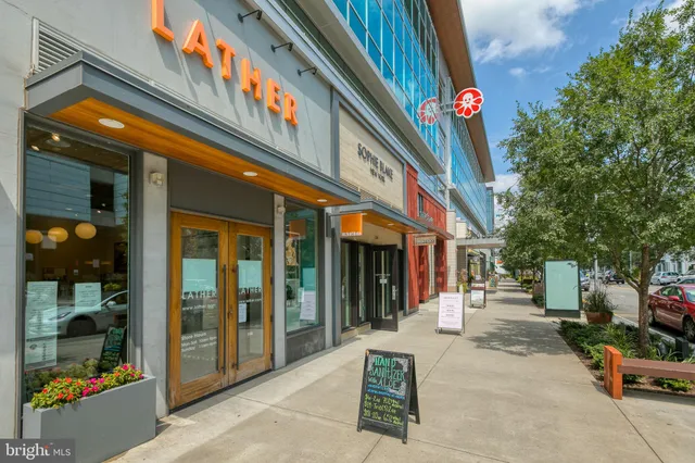 a view of a building with sitting area