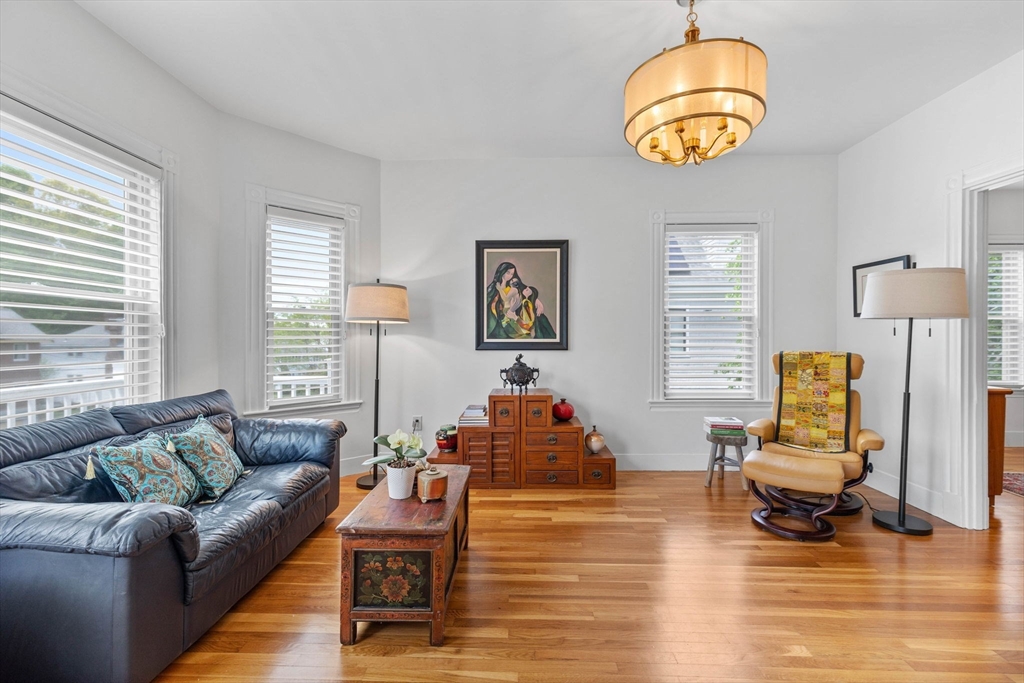 228 Langley Road Newton, MA 02459 - Photo 12 of 39 a living room with furniture