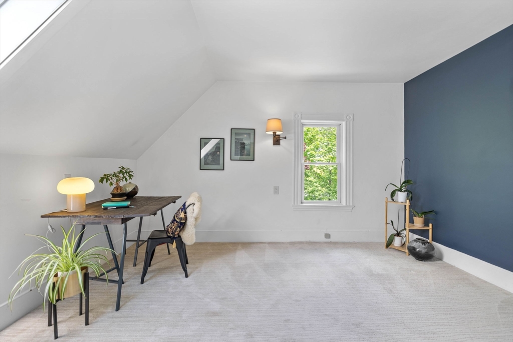 228 Langley Road Newton, MA 02459 - Photo 29 of 39 a workspace with furniture and a window