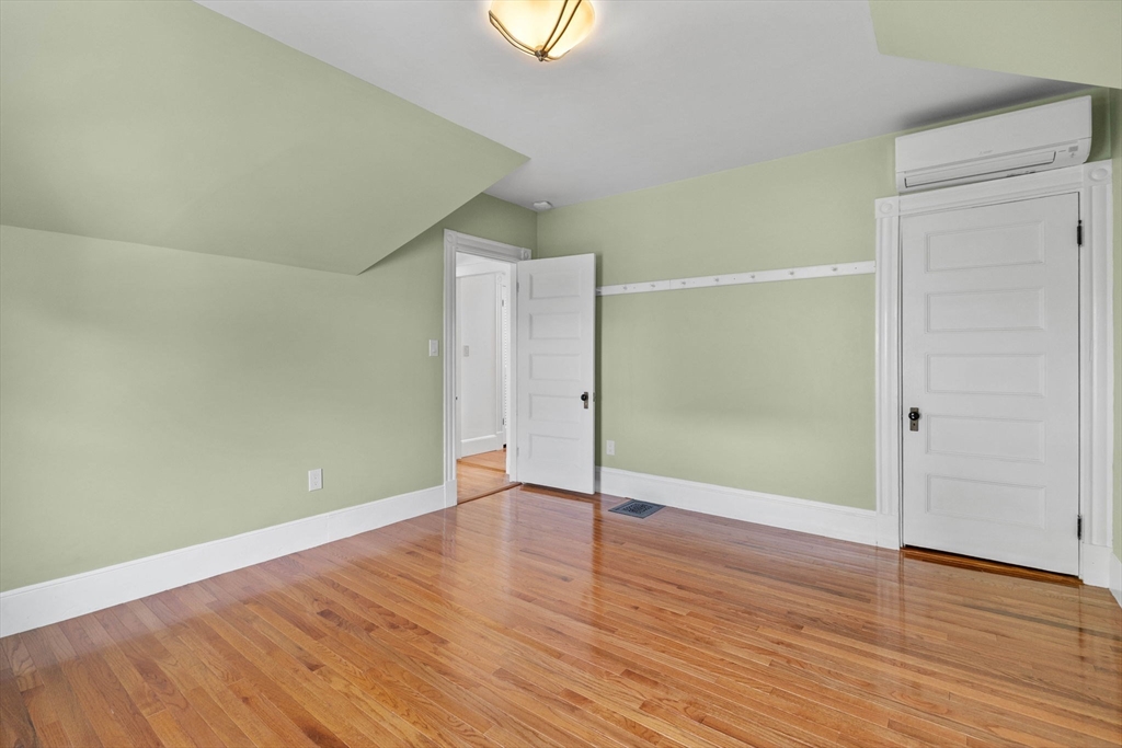 228 Langley Road Newton, MA 02459 - Photo 33 of 39 wooden floor in an empty room