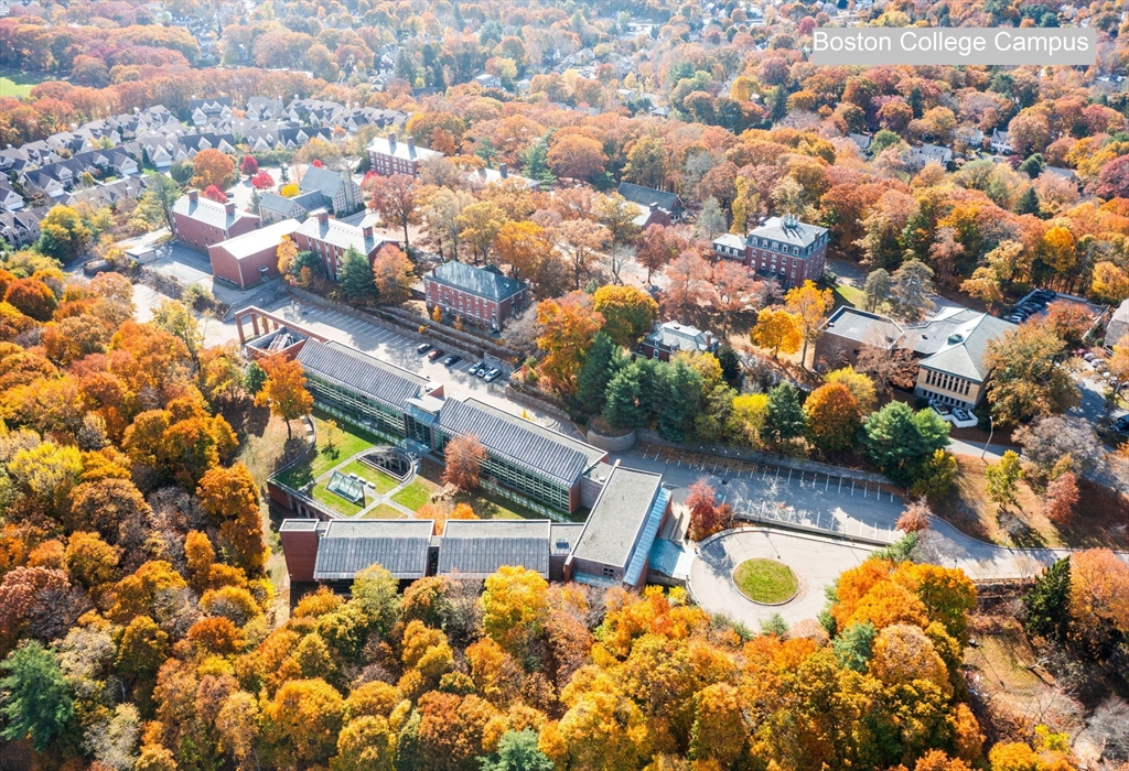 228 Langley Road Newton, MA 02459 - Photo 38 of 39 an aerial view of a house with yard swimming pool and outdoor seating