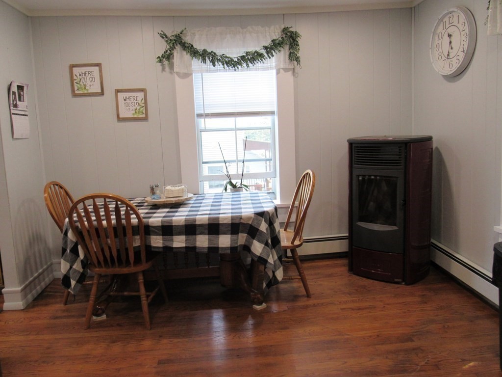 18 Blandford Hill Road Huntington, MA 01050 - Photo 14 of 33 a view of a dining room with furniture window and wooden floor