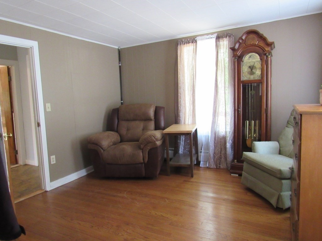 18 Blandford Hill Road Huntington, MA 01050 - Photo 15 of 33 a living room with furniture and a window