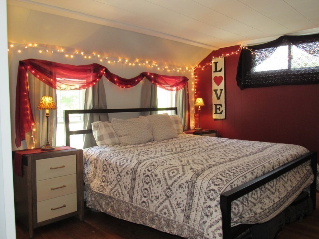 18 Blandford Hill Road Huntington, MA 01050 - Photo 16 of 33 a bedroom with a bed dresser and a window