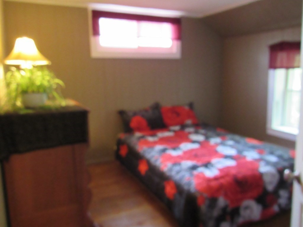 18 Blandford Hill Road Huntington, MA 01050 - Photo 18 of 33 a bedroom with a bed and a window