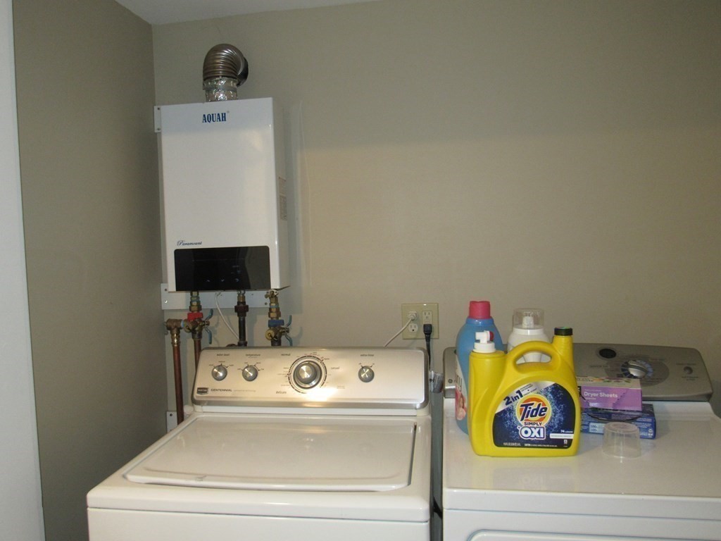 18 Blandford Hill Road Huntington, MA 01050 - Photo 22 of 33 a utility room with dryer and washer