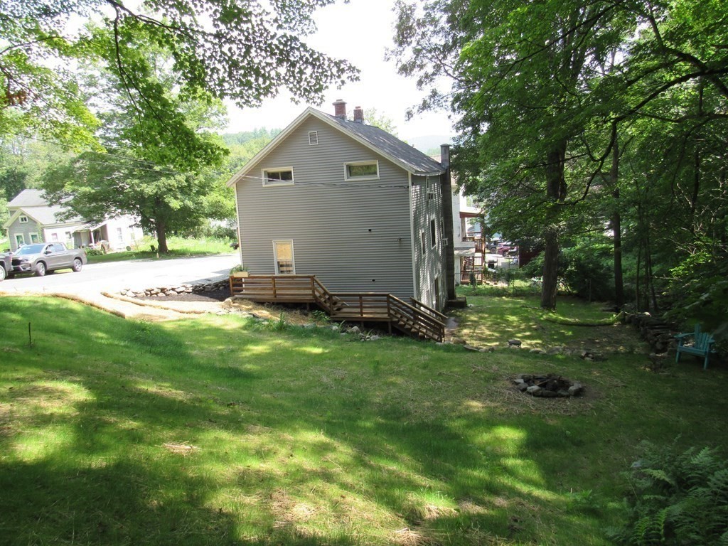 18 Blandford Hill Road Huntington, MA 01050 - Photo 7 of 33 a front view of a house with garden