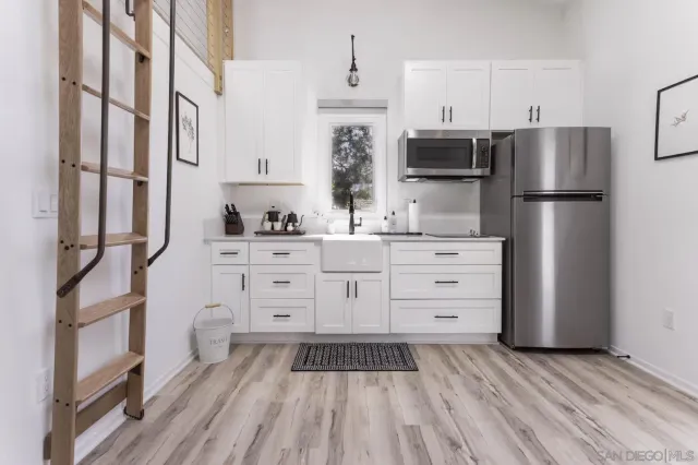 an aerial view of a house with a garden