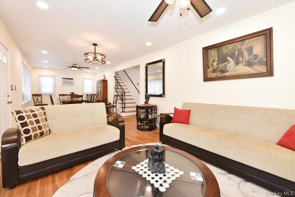 19 Sprague Drive Valley Stream, NY 11580 - Photo 8 of 30 a living room with furniture and wooden floor