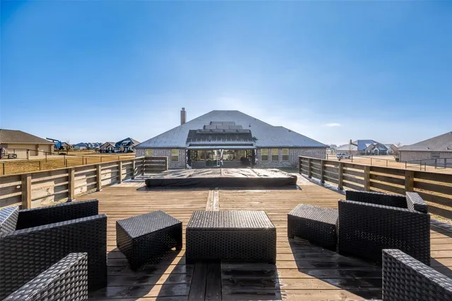 with white house with a large trees