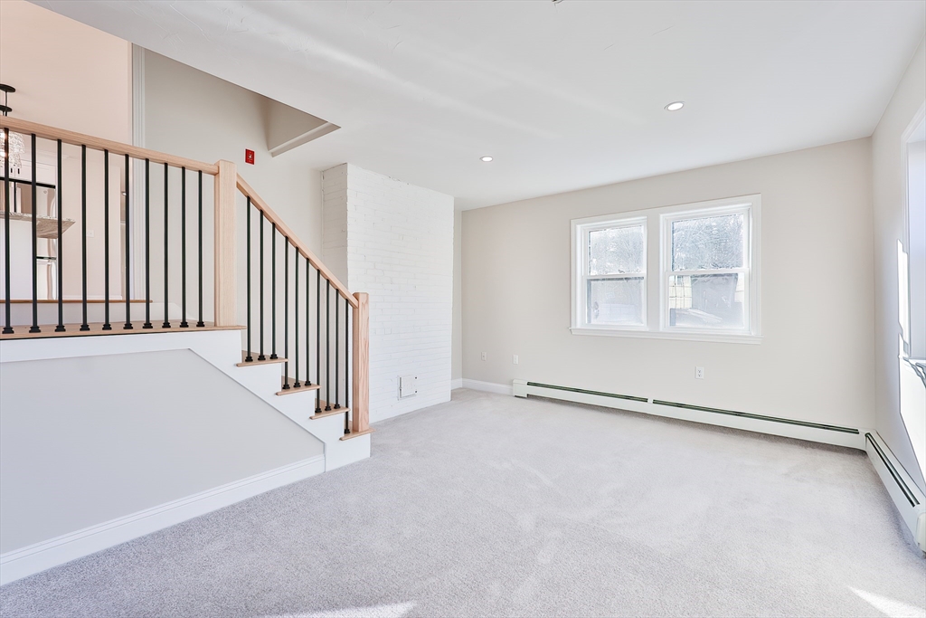 8 Dianthus Road Holbrook, MA 02343 - Photo 9 of 20 en view interior of a house with stairs