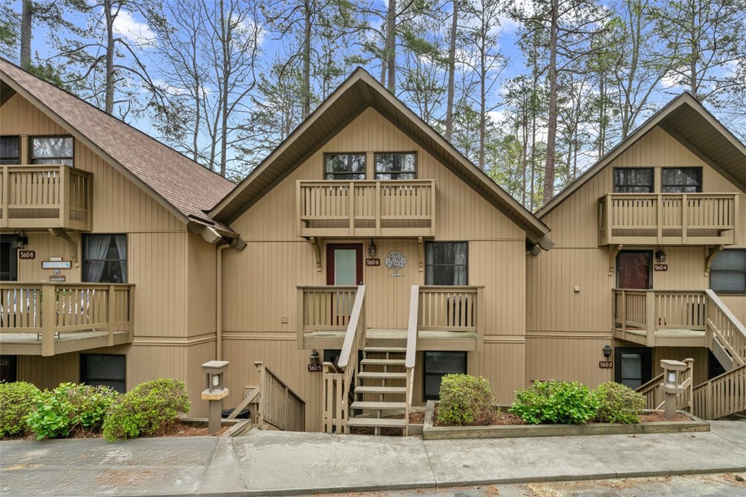 560 South Flagship Drive, Unit 6 Salem, SC 29676 - Photo 1 of 14 This multi-level residence features appealing balconies, providing charming outdoor spaces amidst natural surroundings.