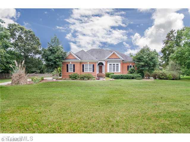5209 Red Fox Drive Oak Ridge, NC 27310 - Photo 1 of 16 Exterior Front.