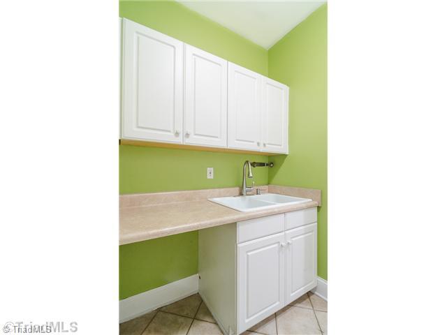 5209 Red Fox Drive Oak Ridge, NC 27310 - Photo 12 of 16 Laundry Room.