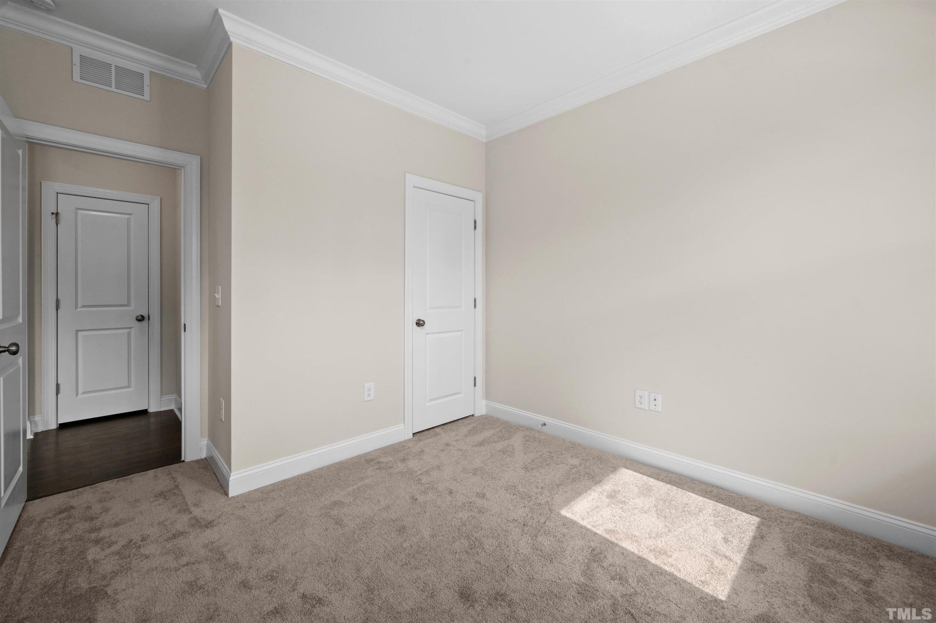 2917 Early Planting Avenue Apex, NC 27502 - Photo 19 of 41 a view of an empty room and closet area