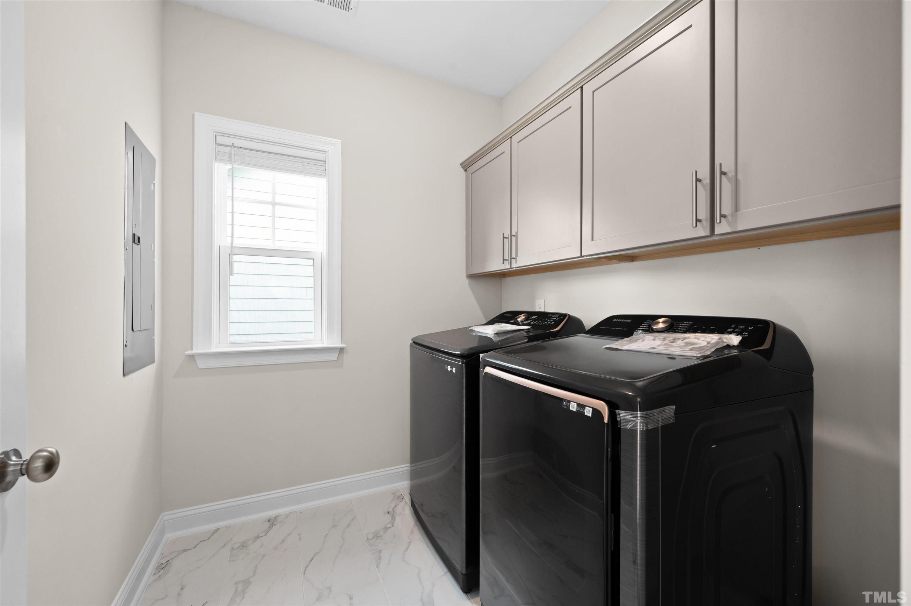 2917 Early Planting Avenue Apex, NC 27502 - Photo 23 of 41 a utility room with dryer and washer