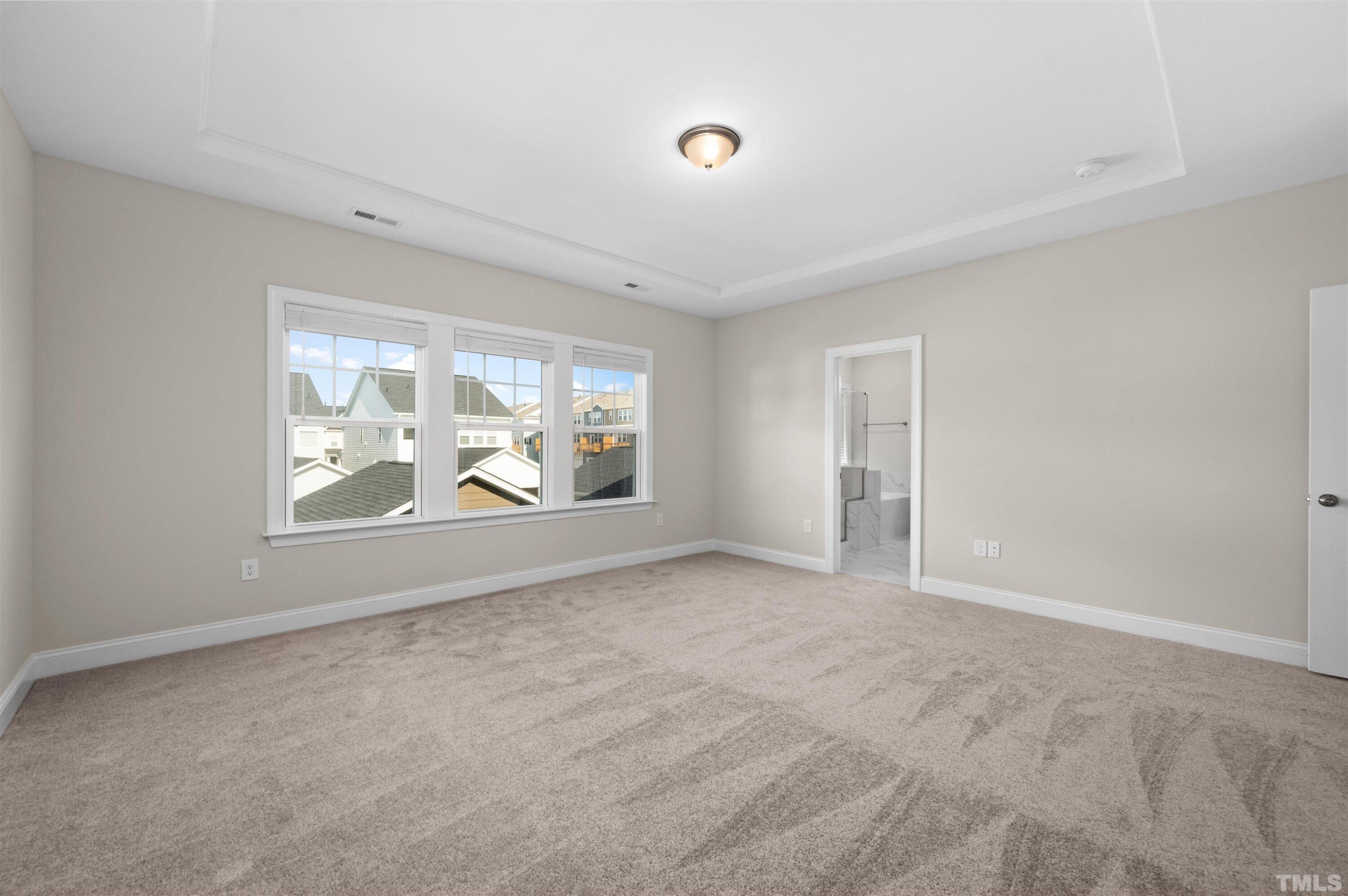 2917 Early Planting Avenue Apex, NC 27502 - Photo 25 of 41 an empty room with windows