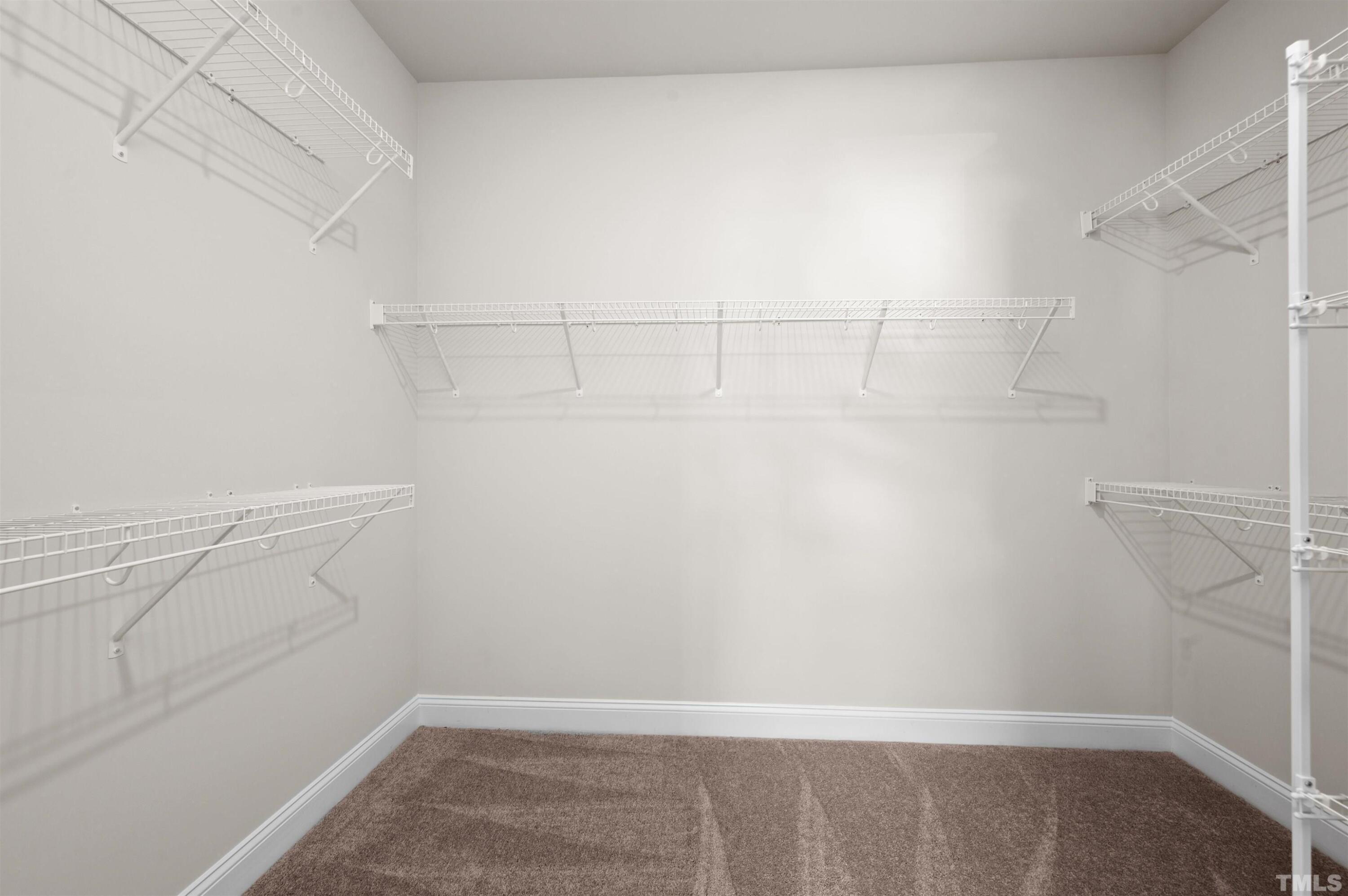 2917 Early Planting Avenue Apex, NC 27502 - Photo 28 of 41 a view of a room with racks on the wall