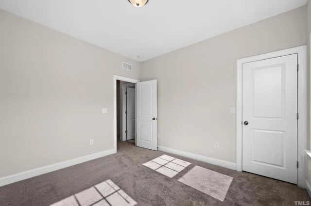 a bathroom with a double vanity sink toilet mirror and bathtub