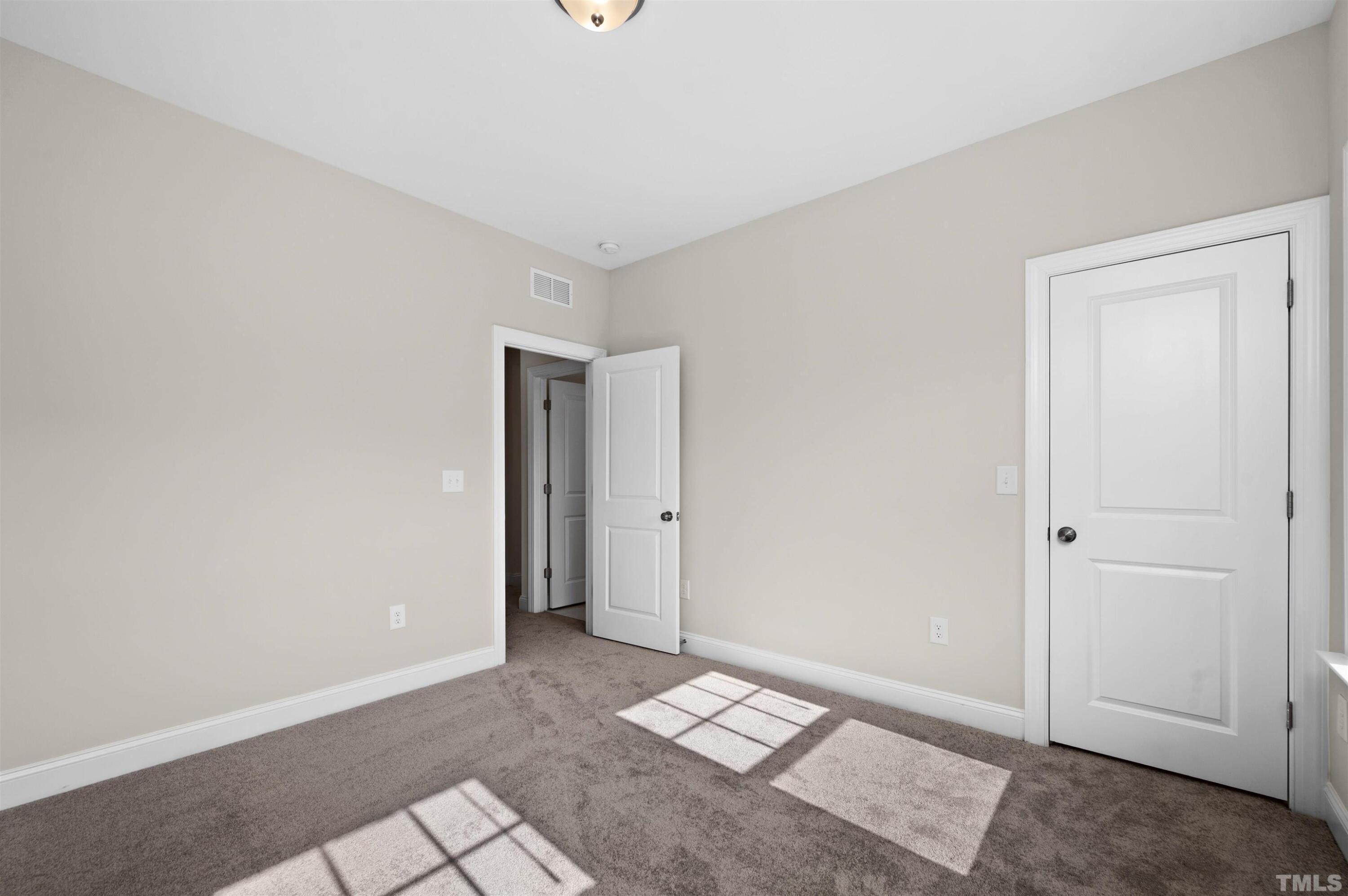 2917 Early Planting Avenue Apex, NC 27502 - Photo 30 of 41 a view of an empty room